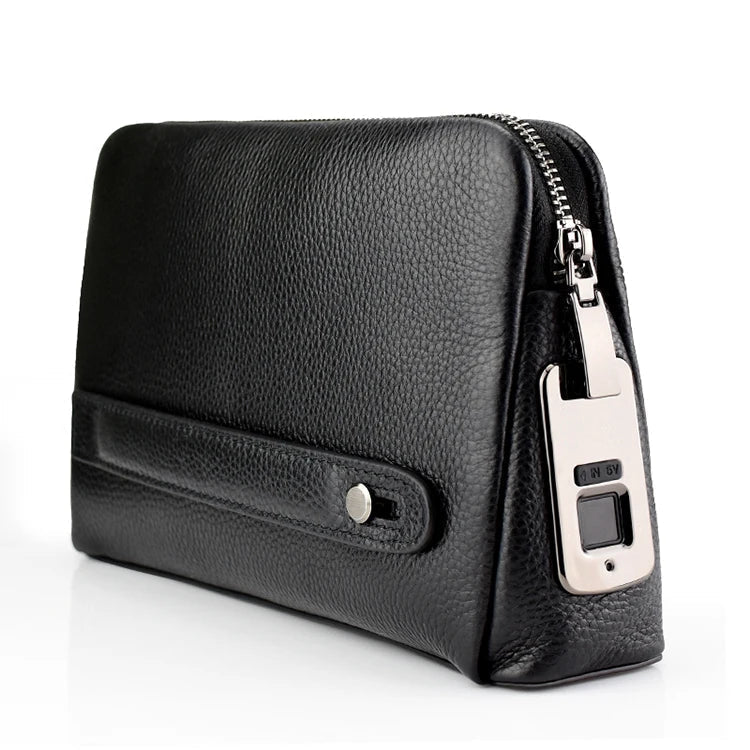 Close-up of the biometric fingerprint lock on a blackish-blue men's anti-theft leather clutch bag.