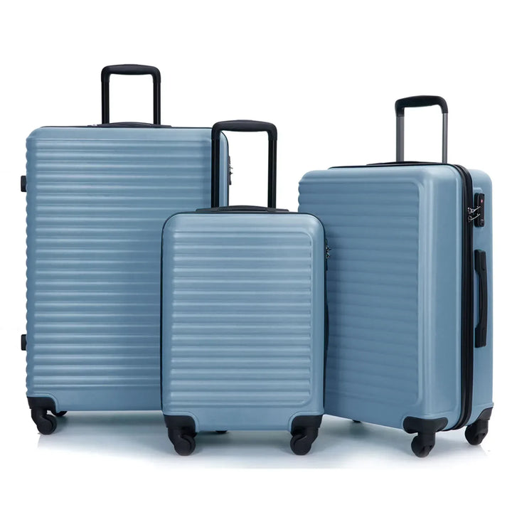 Blue 3-piece ABS hardshell luggage set. Durable spinner suitcases for all your travel adventures.