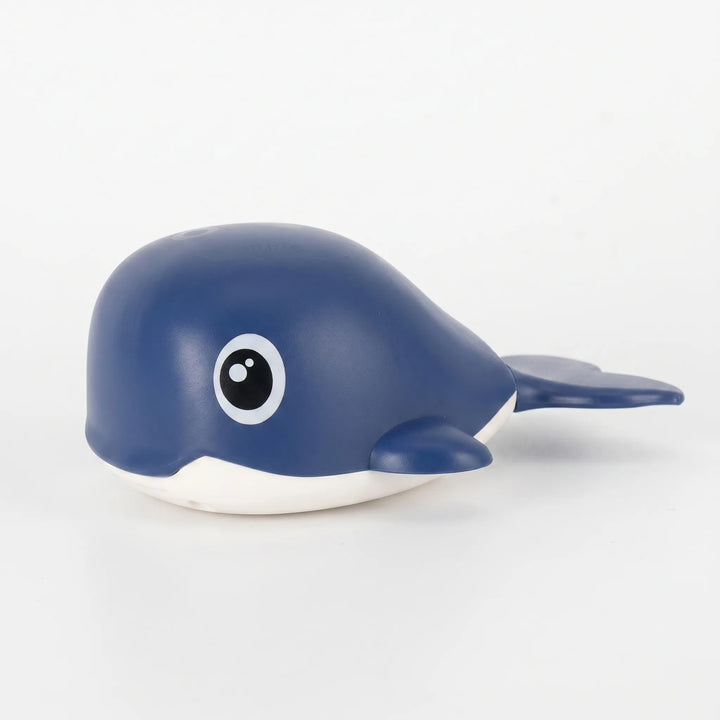 Wind-up whale floating bath toy for toddlers, a battery-free water toy bringing joy to kids' playtime.