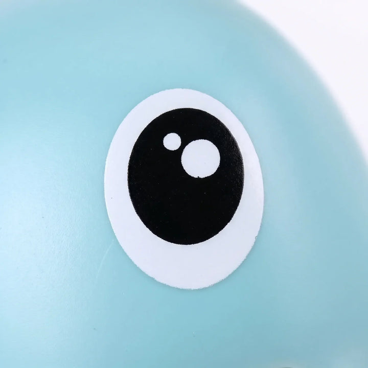 Animated floating whale bath toy in action, a battery-free wind-up water toy bringing smiles to kids.