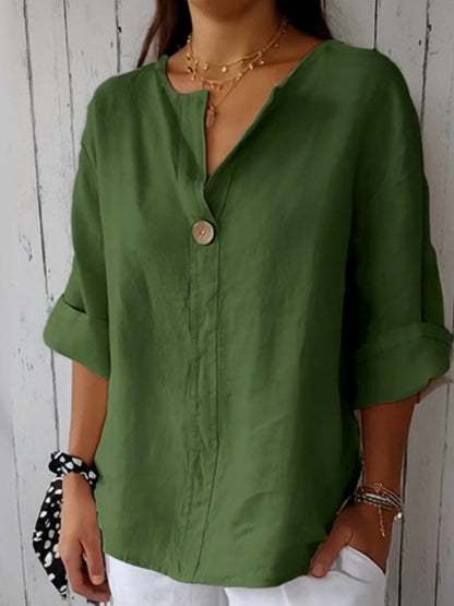 "Blusa da donna elegante, scollo a V, tessuto leggero e versatile, perfetto per un look raffinato e comodo"