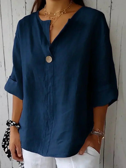"Blusa da donna elegante, scollo a V, tessuto leggero e versatile, perfetto per un look raffinato e comodo"