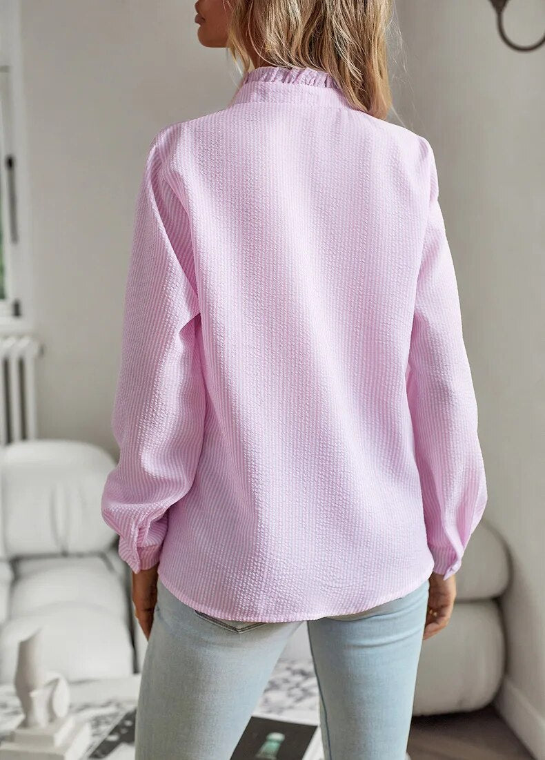 "Blusa donna drappeggiata in cotone con ruches eleganti, stile sofisticato, dettaglio femminile, disponibile in vari colori."