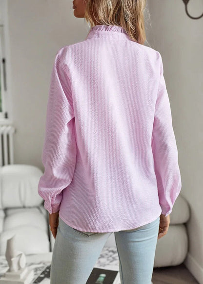 "Blusa donna drappeggiata in cotone con ruches eleganti, stile sofisticato, dettaglio femminile, disponibile in vari colori."