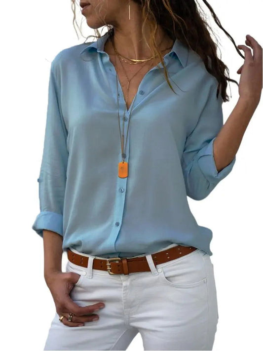 "Blusa estiva da donna a maniche corte con scollo a V, design moderno, colore chiaro, ideale per look eleganti e casuali."
