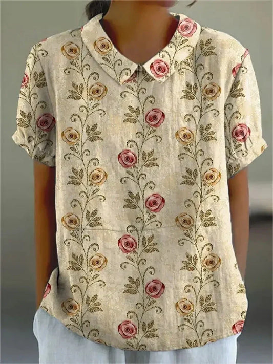 "Blusa floreale elegante in cotone e lino, colori vivaci, design versatile, vestibilità comoda per donna"