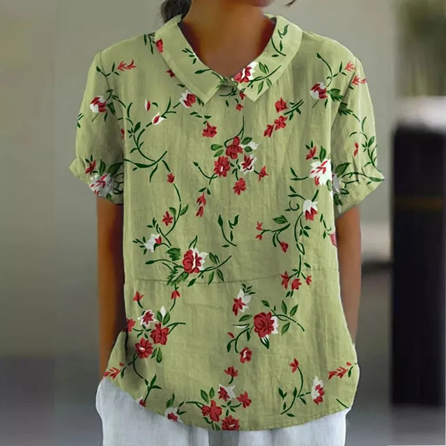 "Blusa floreale elegante in cotone e lino, colori vivaci, design versatile, vestibilità comoda per donna"