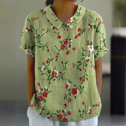 "Blusa floreale elegante in cotone e lino, colori vivaci, design versatile, vestibilità comoda per donna"