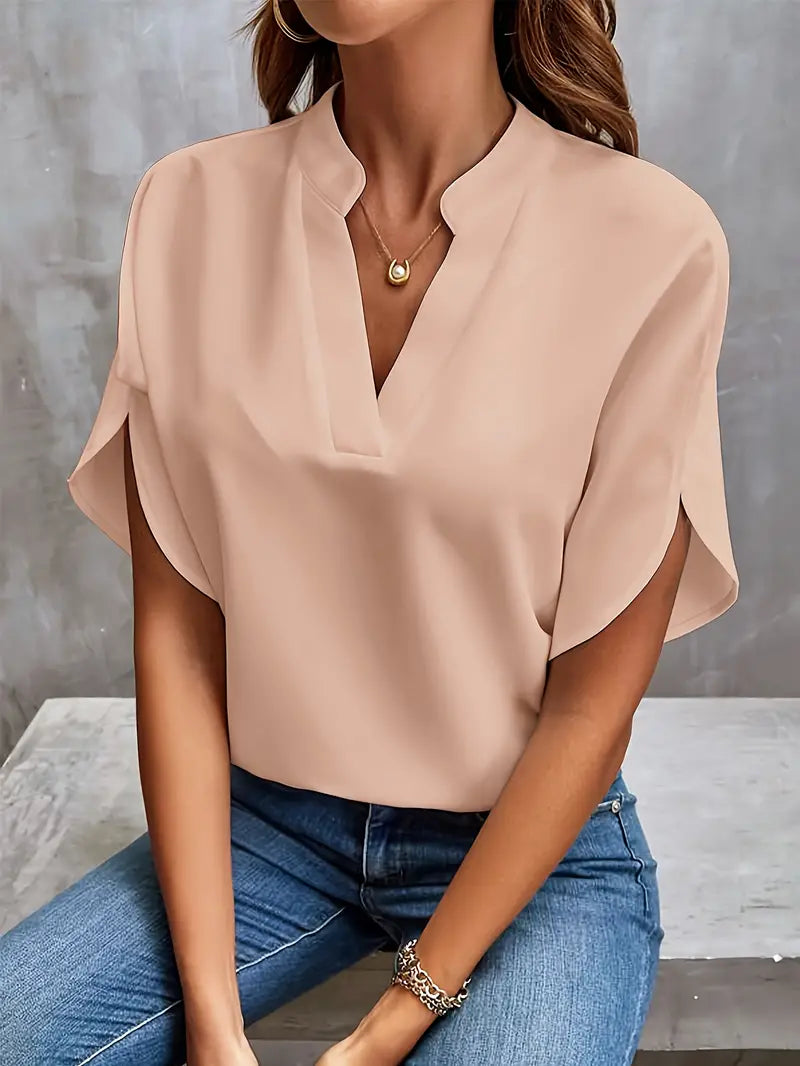 "Blusa leggera donna V-neck, colori vivaci, design elegante, perfetta per la primavera, moda eco-consapevole, comfort elevato