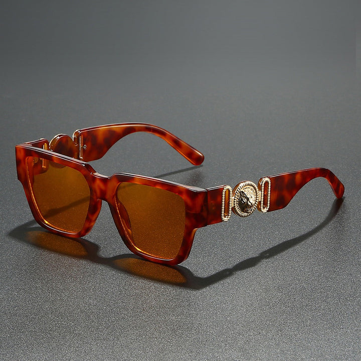 Unisex square frame shades for a bold look. UV400 protected eyewear, a trendy summer fashion accessory.