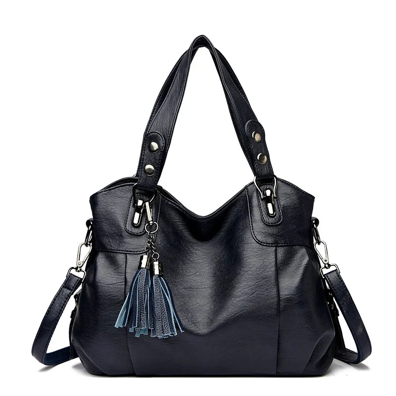 "Borsa a spalla elegante in pelle genuina; design robusto con chiusura zip e rivetti per stile e praticità."