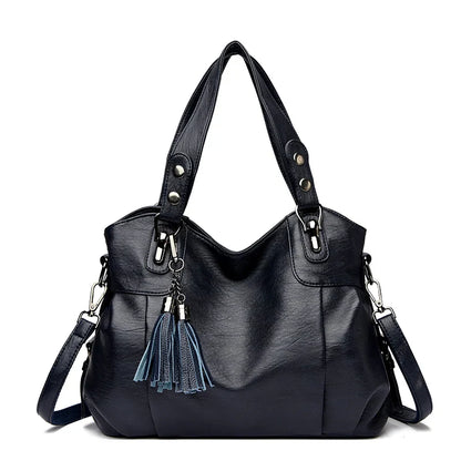 "Borsa a spalla elegante in pelle genuina; design robusto con chiusura zip e rivetti per stile e praticità."