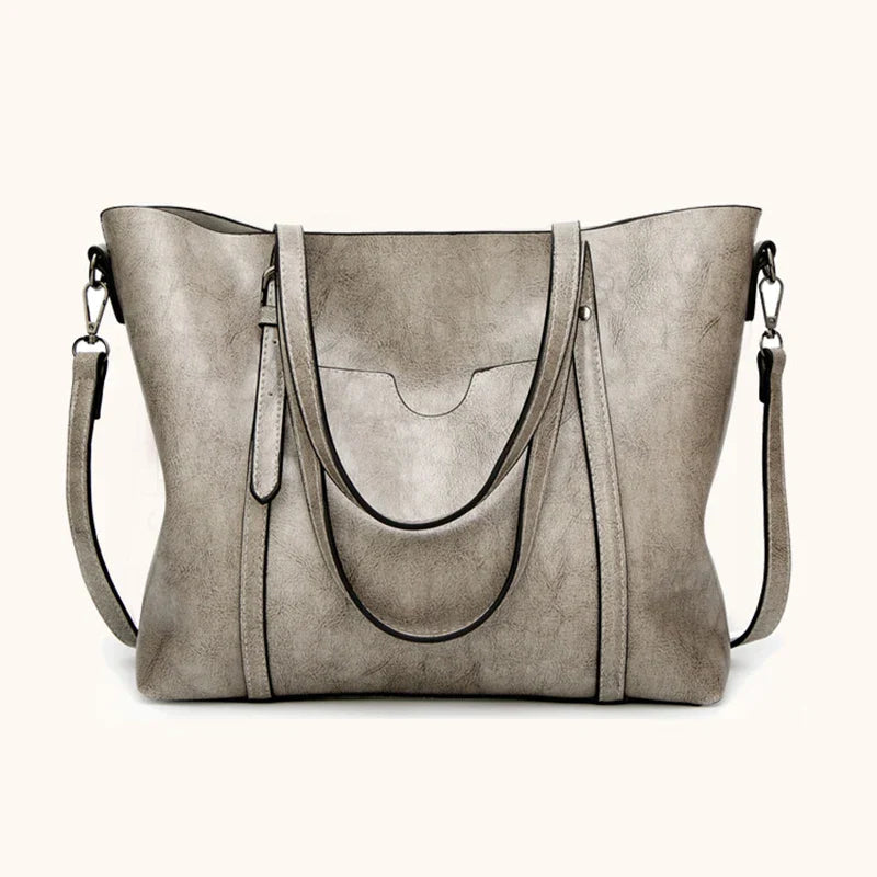 "Borsa da donna in pelle elegante, lusso e funzionalità, vari colori, dettagli di design raffinato per ogni occasione."