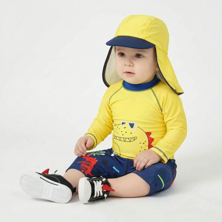 Vibrant cartoon print boys' swim set with a UPF 50+ sun hat. Toddler UV protection swimwear for sun-smart summer fun.