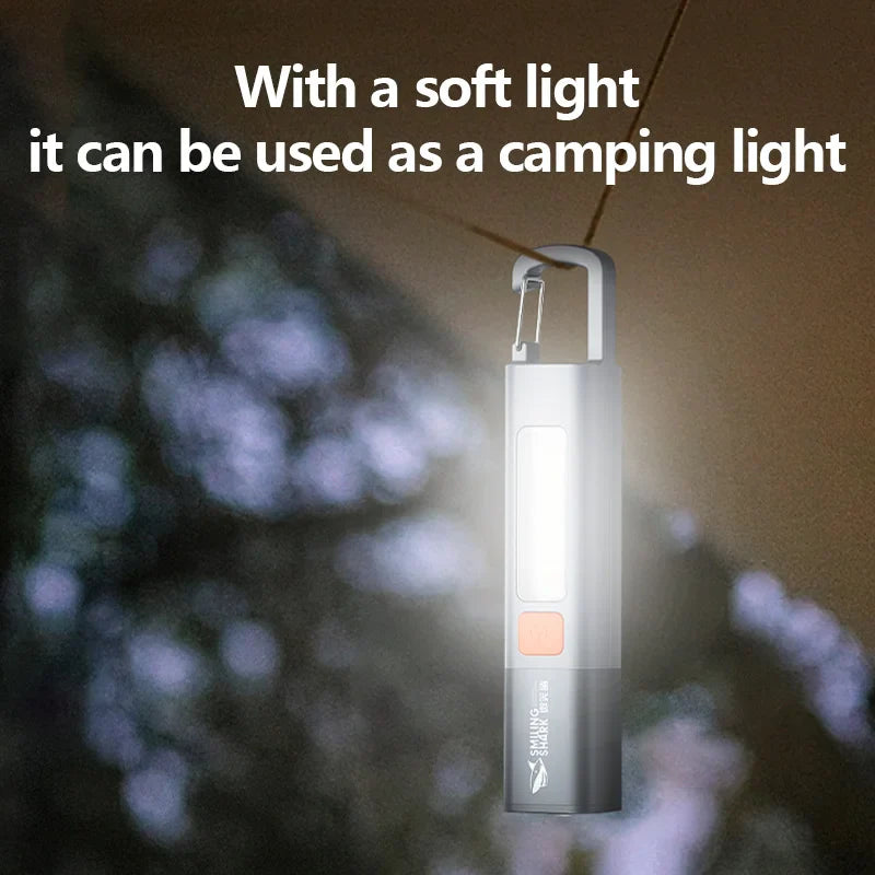 Compact silver LED mini flashlight with hook, waterproof design, ideal portable emergency light