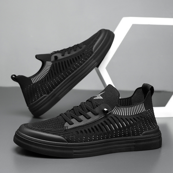 Black men's lightweight comfort sneakers, versatile for everyday wear and walking.