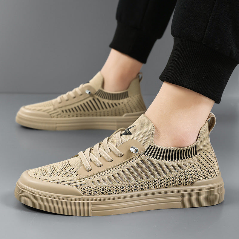 Gray casual men's sneakers, offering lightweight comfort for walking & daily wear.