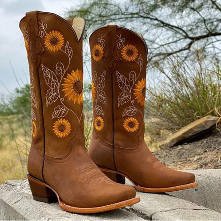 Stylish women's boho Ibiza spirit boots in brown with a unique sunflower pattern. Comfortable festival footwear.