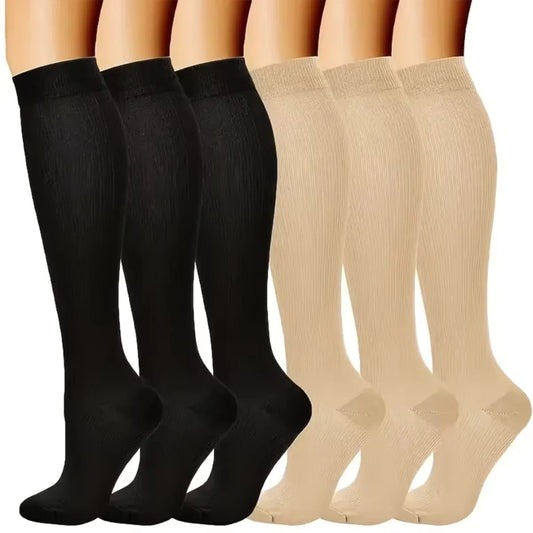 "Calze a compressione graduata donna in sei colori, traspiranti, migliorano circolazione e riducono gonfiore."