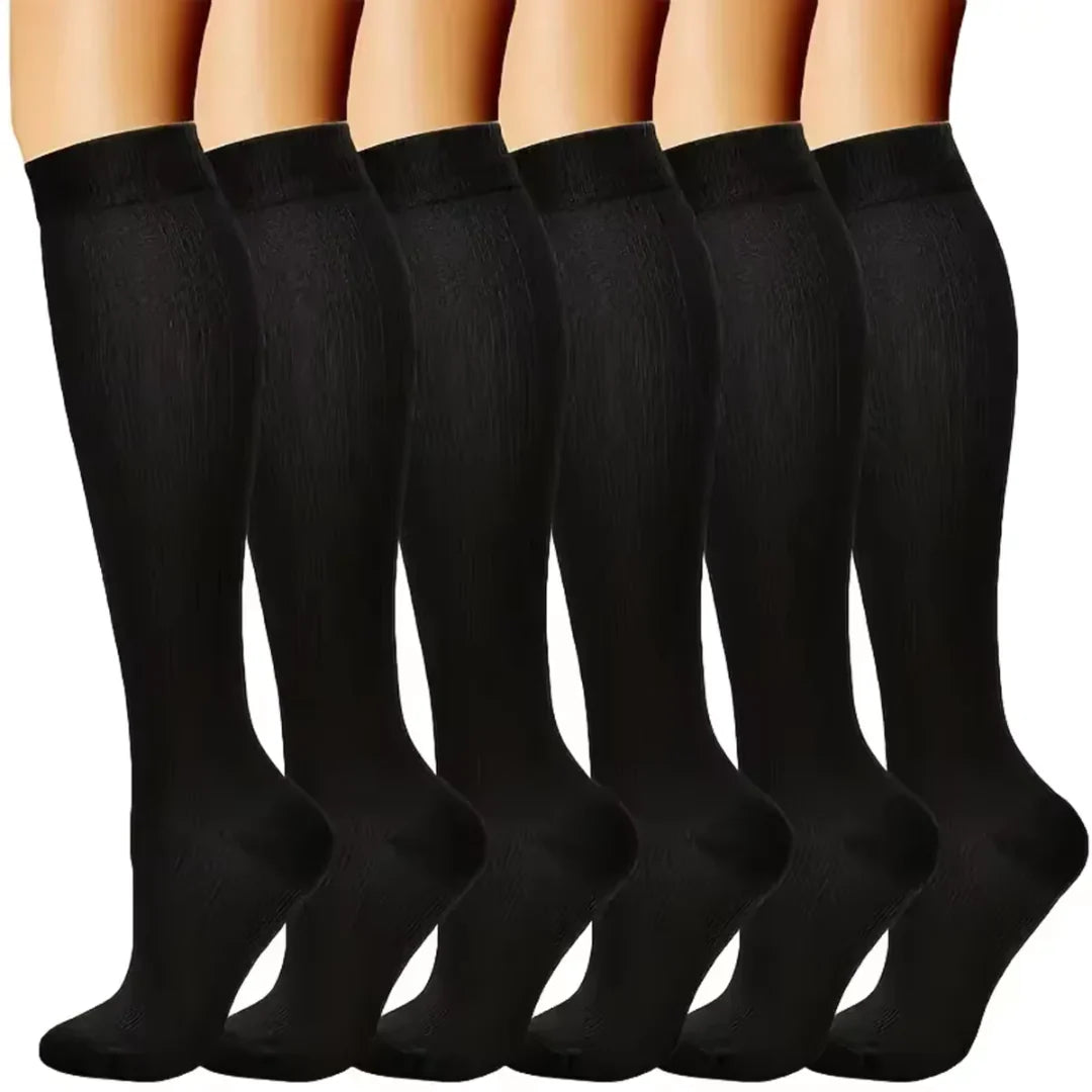 "Calze a compressione graduata donna in sei colori, traspiranti, migliorano circolazione e riducono gonfiore."