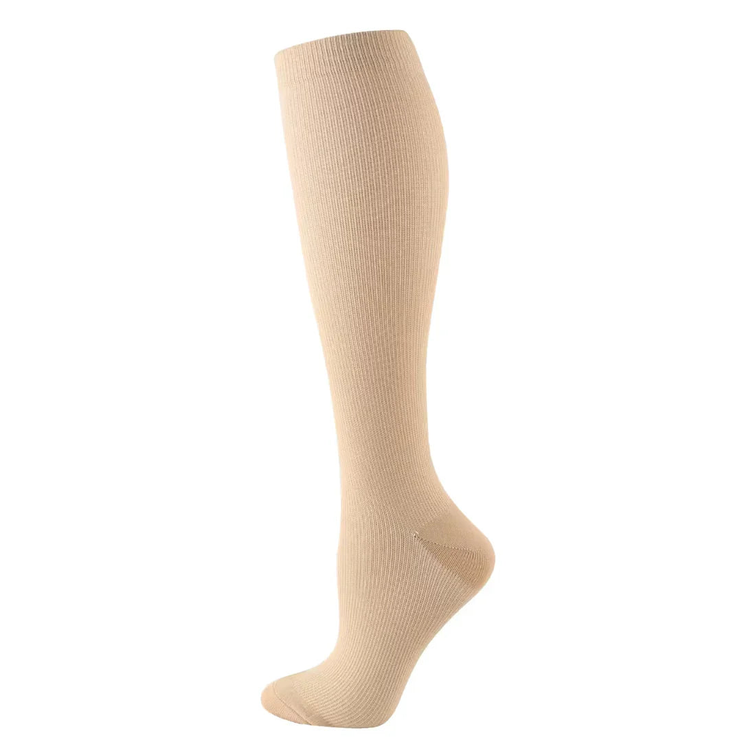 "Calze a compressione graduata donna in sei colori, traspiranti, migliorano circolazione e riducono gonfiore."