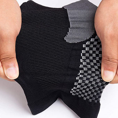 "Calzini a compressione unisex blu e nero, tessuto traspirante, ideali per sport e viaggi, migliorano circolazione e comfort.