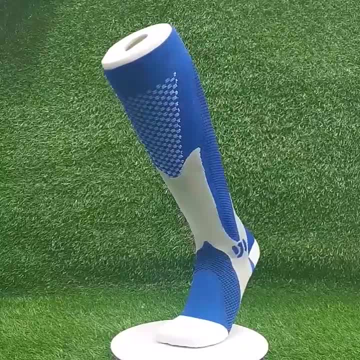 "Calzini a compressione unisex blu e nero, tessuto traspirante, ideali per sport e viaggi, migliorano circolazione e comfort.
