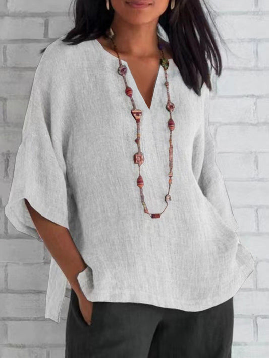 Camicetta blu in lino per donna, scollo a V, stile moderno ed elegante, perfetta per ogni occasione, comoda e traspirante.