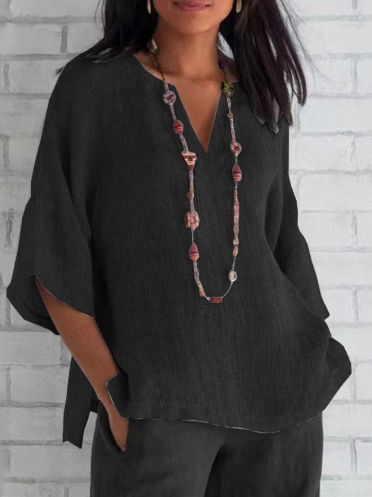 Camicetta blu in lino per donna, scollo a V, stile moderno ed elegante, perfetta per ogni occasione, comoda e traspirante.