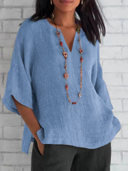 Camicetta blu in lino per donna, scollo a V, stile moderno ed elegante, perfetta per ogni occasione, comoda e traspirante.