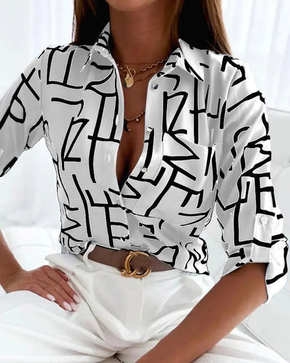 "Camicetta CARMEN donna elegante con maniche lunghe e bottoni raffinati, perfetta per primavera-estate, vista davanti."
