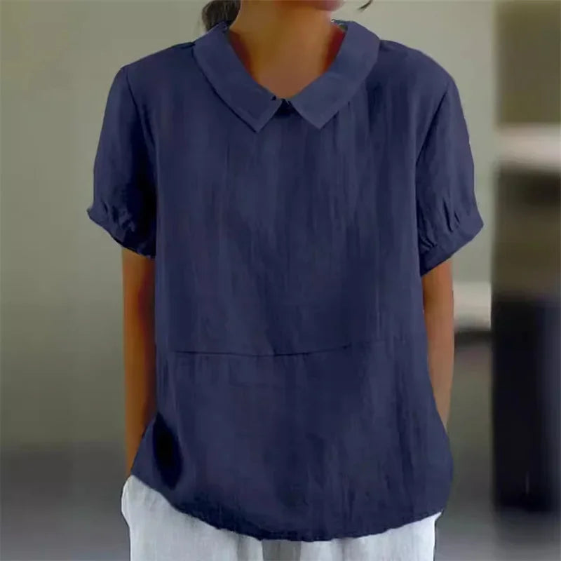 "Camicetta estiva donna lino cotone, design a maniche corte, colletto classico, blu, perfetta per look casual e raffinati."