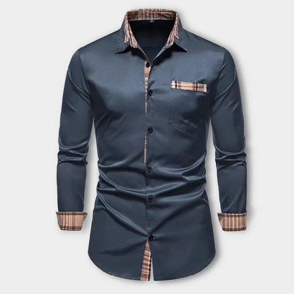 "Camicia classica da uomo, nera, taglio sartoriale, elegante e versatile, perfetta per eventi speciali o professionali."