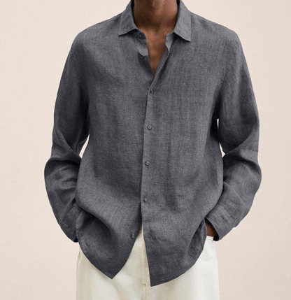 "Camicia classica uomo in lino bianco, maniche lunghe, traspirante e leggera, perfetta per look estivi eleganti e versatili."