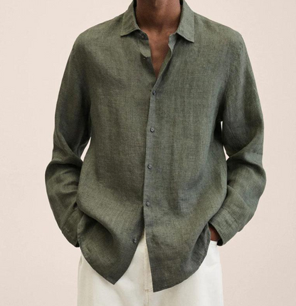 "Camicia classica uomo in lino bianco, maniche lunghe, traspirante e leggera, perfetta per look estivi eleganti e versatili."