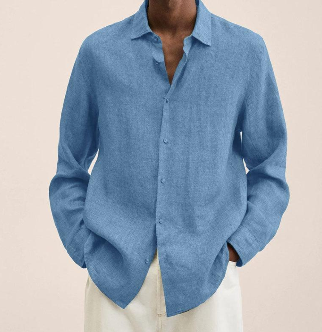 "Camicia classica uomo in lino bianco, maniche lunghe, traspirante e leggera, perfetta per look estivi eleganti e versatili."