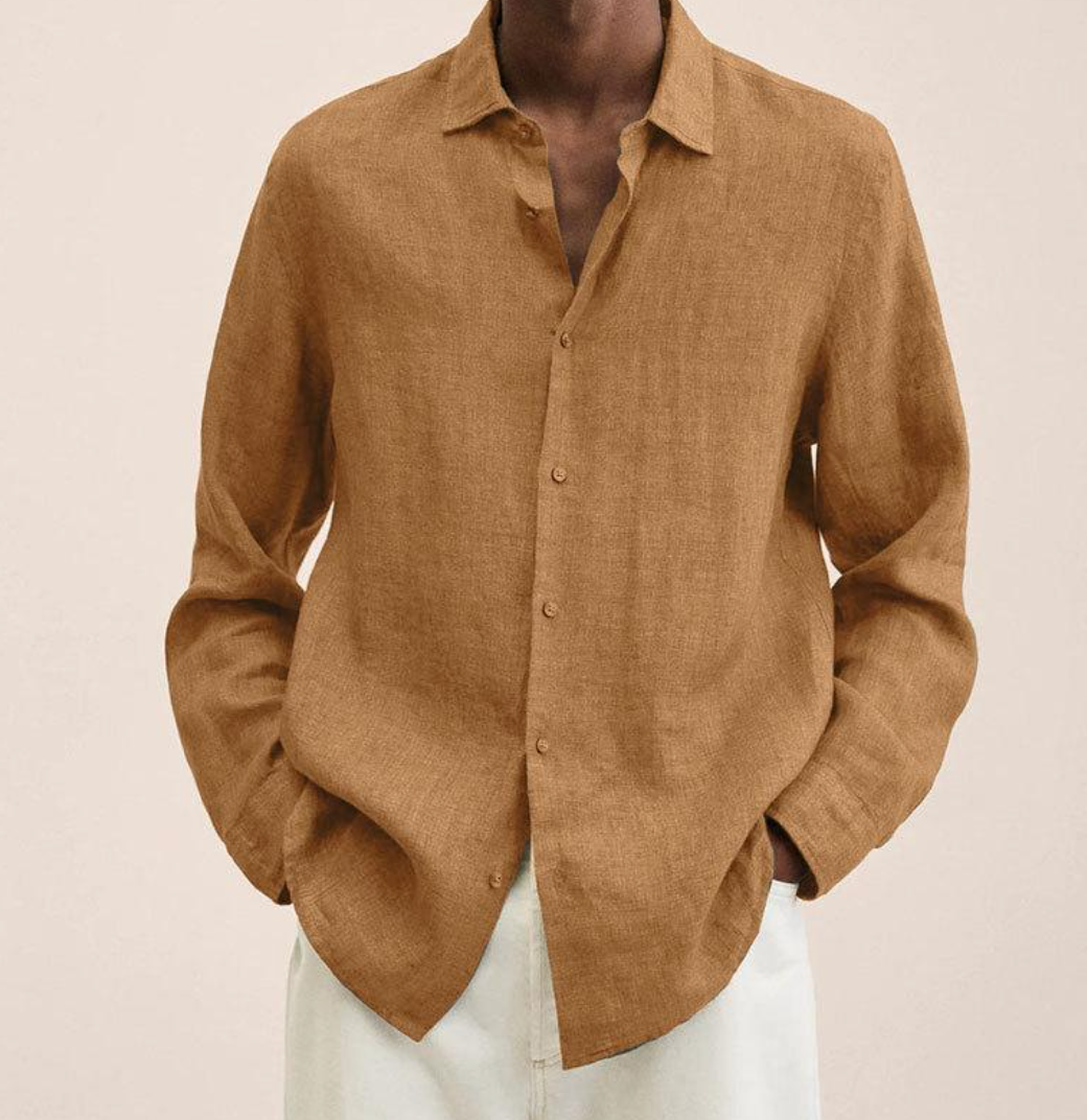 "Camicia classica uomo in lino bianco, maniche lunghe, traspirante e leggera, perfetta per look estivi eleganti e versatili."