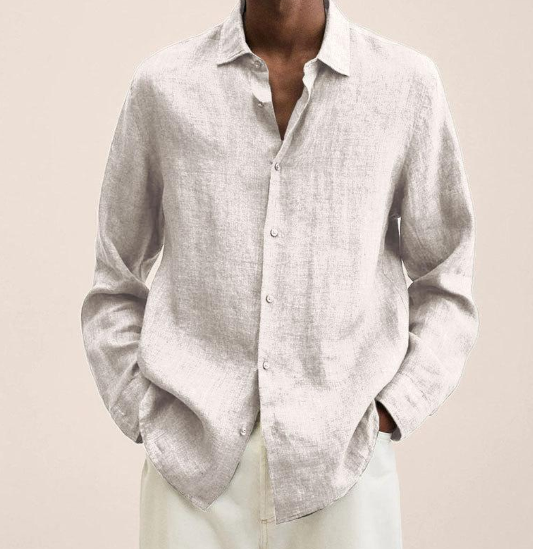 "Camicia classica uomo in lino bianco, maniche lunghe, traspirante e leggera, perfetta per look estivi eleganti e versatili."