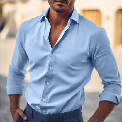 "Camicia elegante da uomo in cotone bianco, taglio classico, ideale per look casual e formali, colletto strutturato."