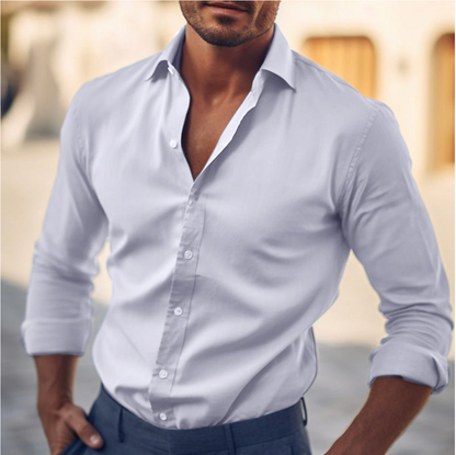"Camicia elegante da uomo in cotone bianco, taglio classico, ideale per look casual e formali, colletto strutturato."