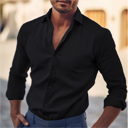 "Camicia elegante da uomo in cotone bianco, taglio classico, ideale per look casual e formali, colletto strutturato."