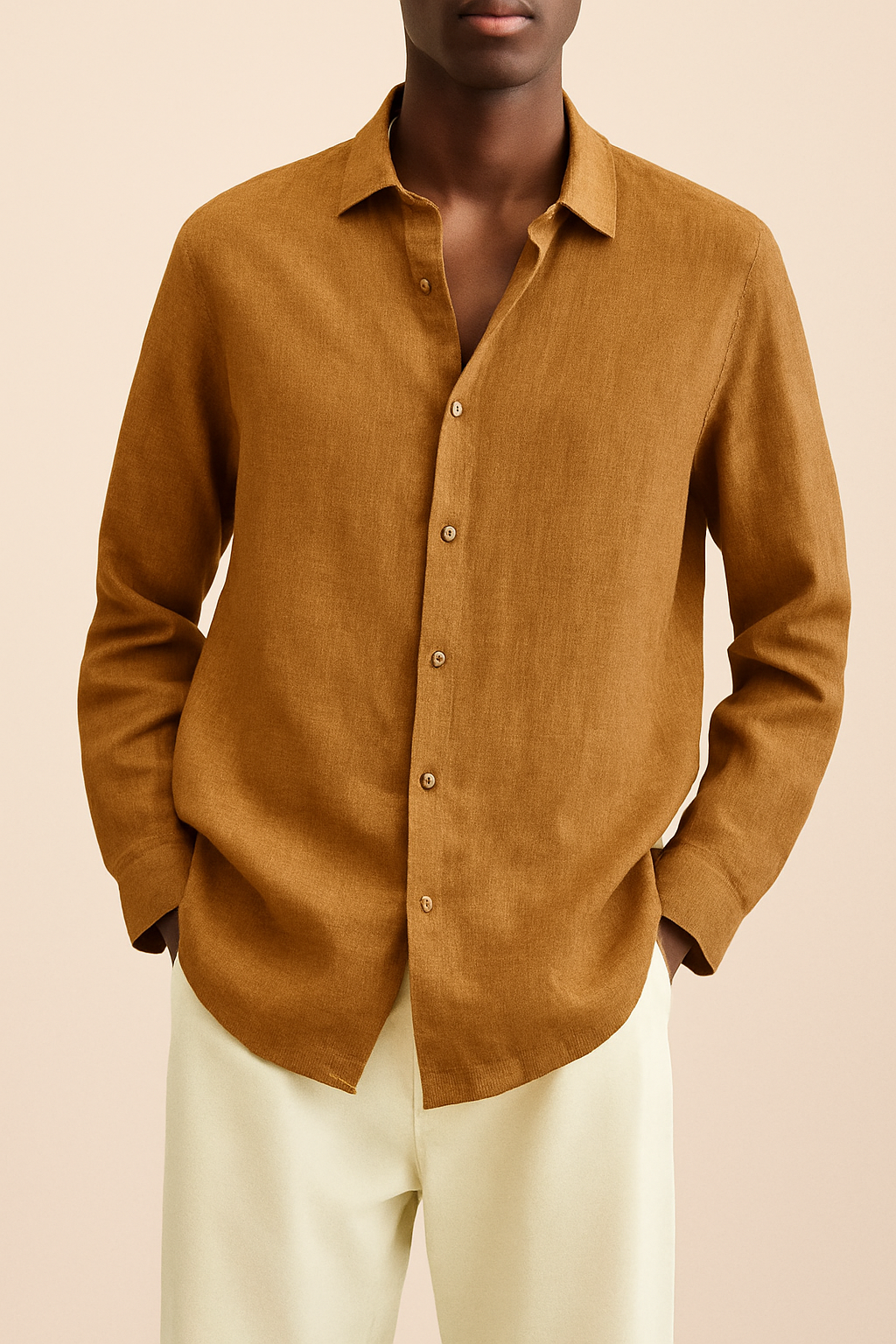 Camicia elegante uomo in lino, maniche lunghe, tessuto leggero e traspirante, ideale per look estivo moderno e raffinato.