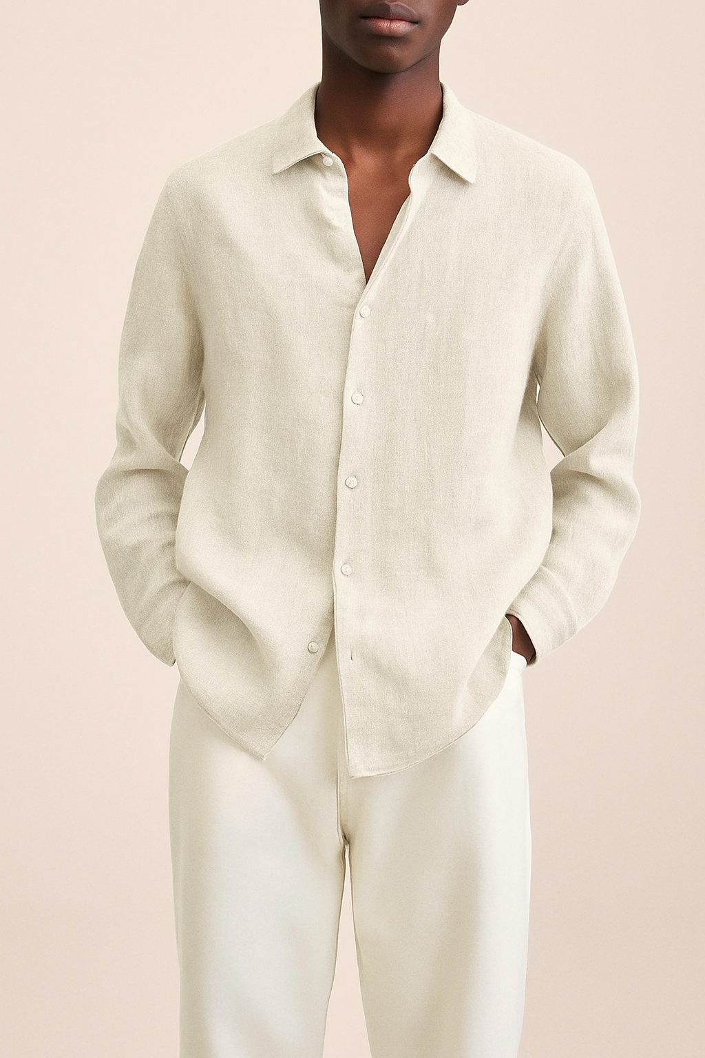 Camicia elegante uomo in lino, maniche lunghe, tessuto leggero e traspirante, ideale per look estivo moderno e raffinato.