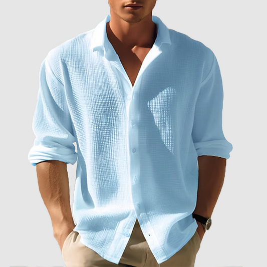 "Camicia estiva elegante da uomo, maniche lunghe, colore blu scuro, design classico e moderno, perfetta per ogni occasione."