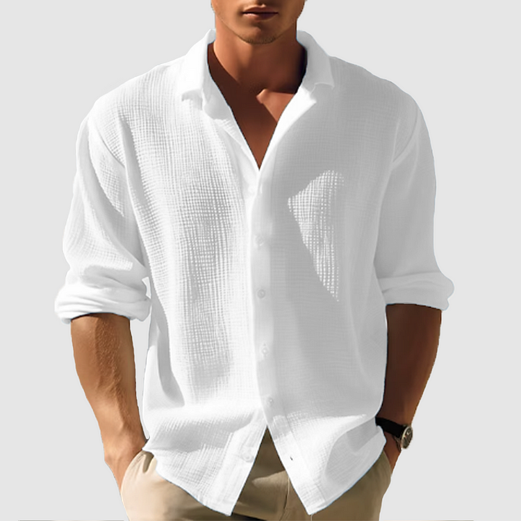 "Camicia estiva elegante da uomo, maniche lunghe, colore blu scuro, design classico e moderno, perfetta per ogni occasione."