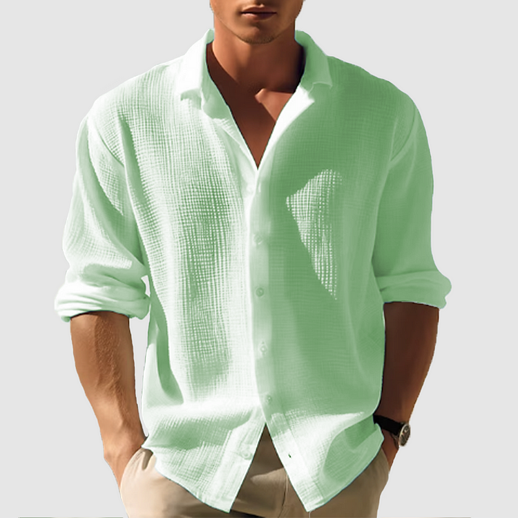 "Camicia estiva elegante da uomo, maniche lunghe, colore blu scuro, design classico e moderno, perfetta per ogni occasione."