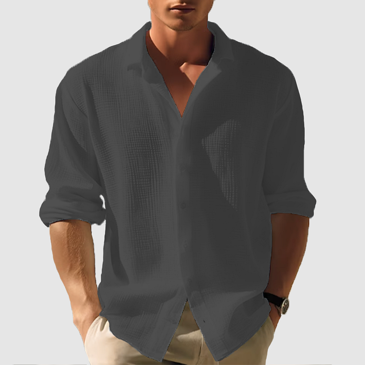 "Camicia estiva elegante da uomo, maniche lunghe, colore blu scuro, design classico e moderno, perfetta per ogni occasione."
