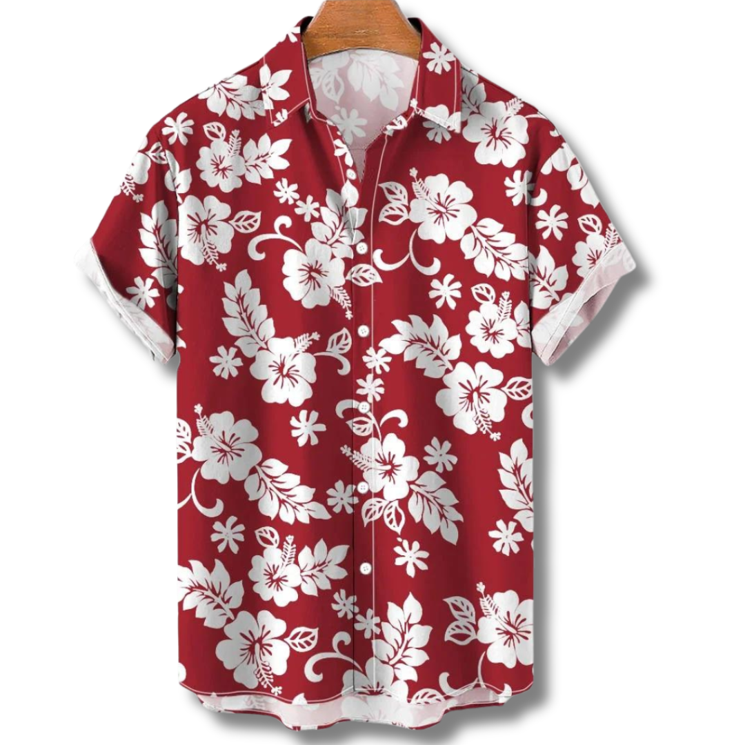 "Camicia Hawaii uomo con stampe tropicali colorate, tessuto leggero e vestibilità estiva, ideale per vacanze e feste."