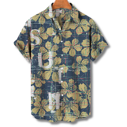 "Camicia Hawaii uomo con stampe tropicali colorate, tessuto leggero e vestibilità estiva, ideale per vacanze e feste."