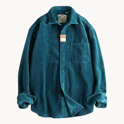 "Camicia uomo corduroy arancione con tasche sul petto, stile classico da lavoro, tessuto morbido e testurizzato."